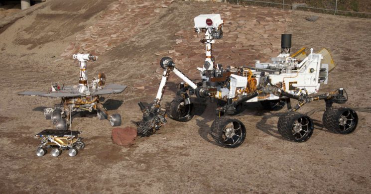 Undated handout photo showing three generations of Rovers in the Mars Test Yard at NASA's Jet Propulsion Laboratory, Pasadena