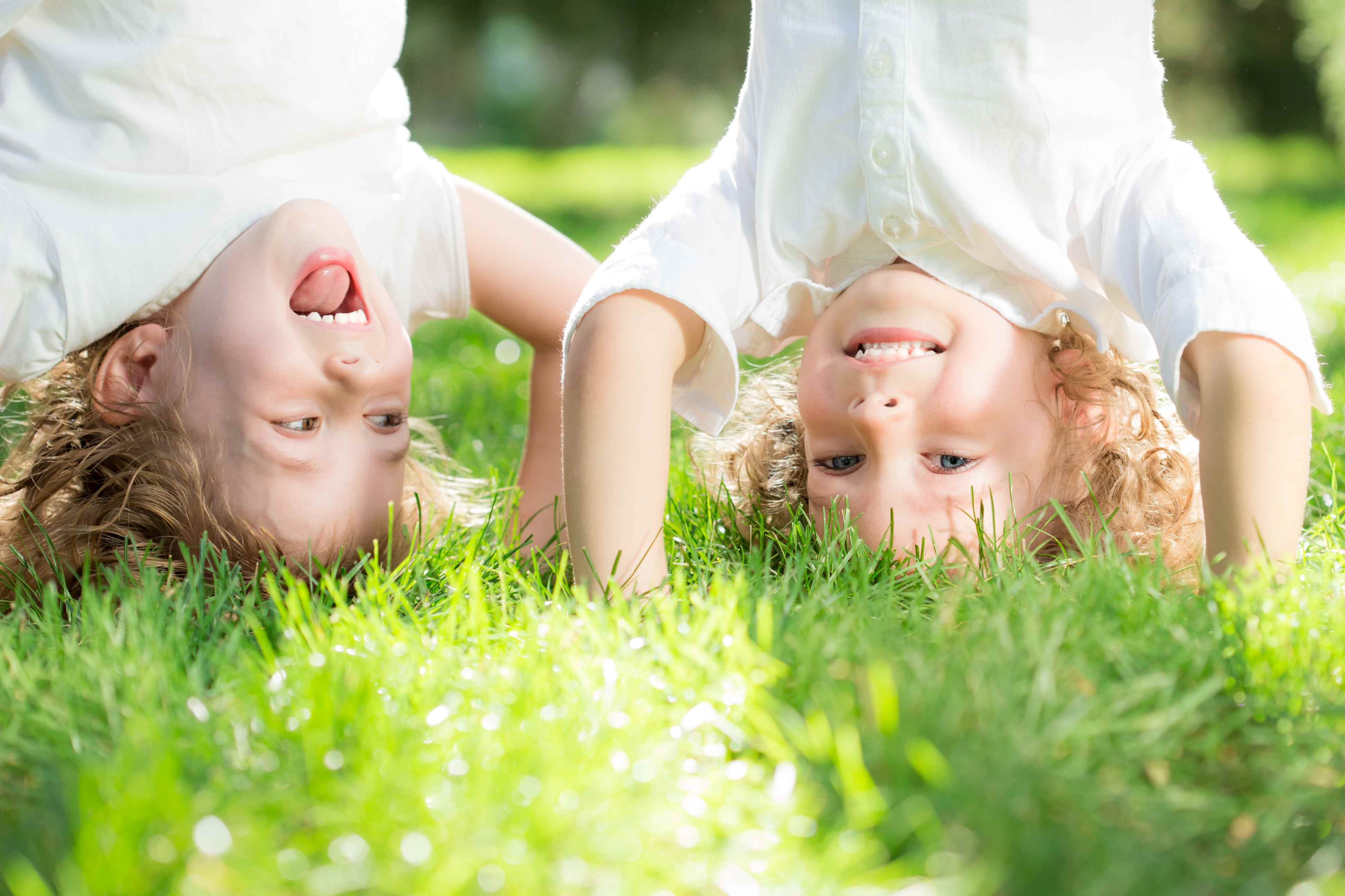 Child standing upside down