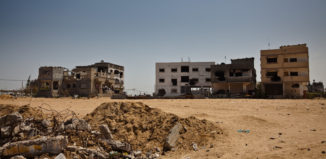 Damaged_housing_gaza_strip_april_2009