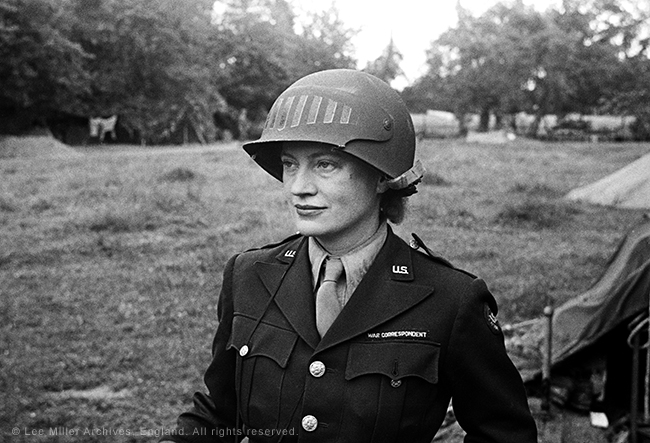 web-5848-28-Lee-Miller-in-steel-helmet-specially-designed-for-using-a-camera-Normandy-Unknown-Photographer-1944