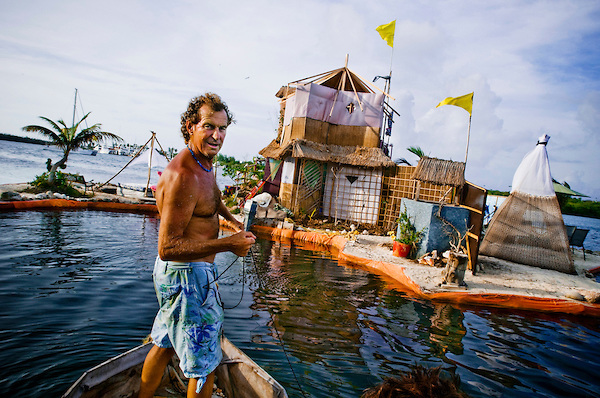 The New Spiral Island British environmentalist and eco-pioneer Richart "Rishie" Sowa, who believes in recycling and low-impact living, has built his own floating island in a lagoon by Isla Mujeres, Mexico. The island is built on over 100 000 plastic bottles and is about 20m in diameter. It has beaches, a house where Sowa lives, 2 ponds, a solar-powered waterfall/river, and solar panels. Mangroves, palmtrees and other plants are growing on it. This is the second Island Sowa has built; The first was destroyed in a hurricane in 2005.